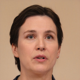 Neutral white adult female with short  brown hair and brown eyes