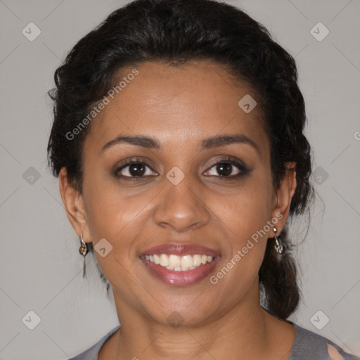 Joyful black young-adult female with medium  brown hair and brown eyes