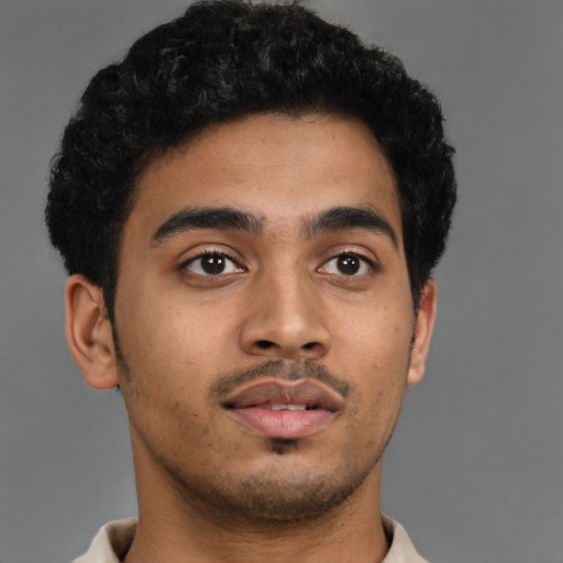 Neutral latino young-adult male with short  brown hair and brown eyes