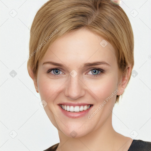 Joyful white young-adult female with short  brown hair and blue eyes