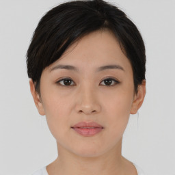 Neutral asian young-adult female with short  brown hair and brown eyes