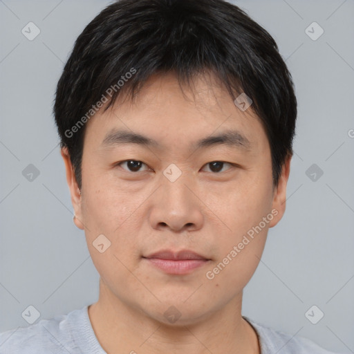 Neutral asian young-adult male with short  black hair and brown eyes