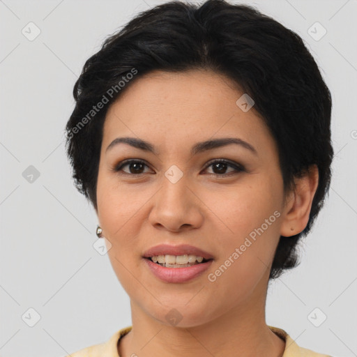 Joyful latino young-adult female with short  brown hair and brown eyes