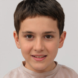 Joyful white child male with short  brown hair and brown eyes