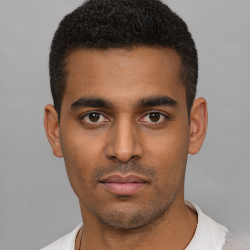 Neutral black young-adult male with short  black hair and brown eyes