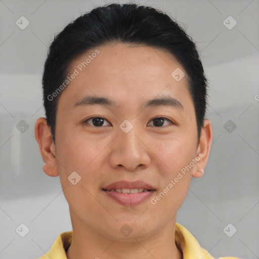 Joyful asian young-adult male with short  brown hair and brown eyes