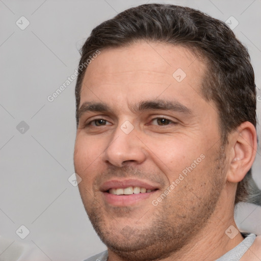 Joyful white adult male with short  brown hair and brown eyes