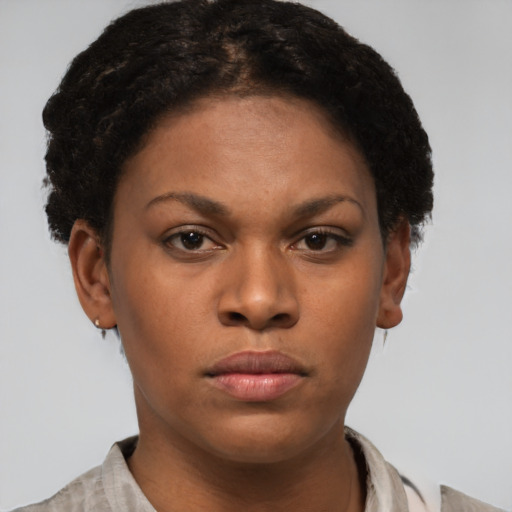 Neutral black young-adult female with short  brown hair and brown eyes