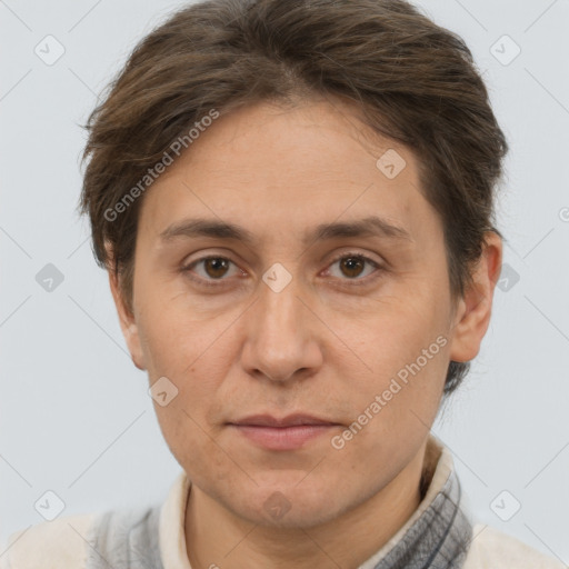 Joyful white adult female with short  brown hair and brown eyes