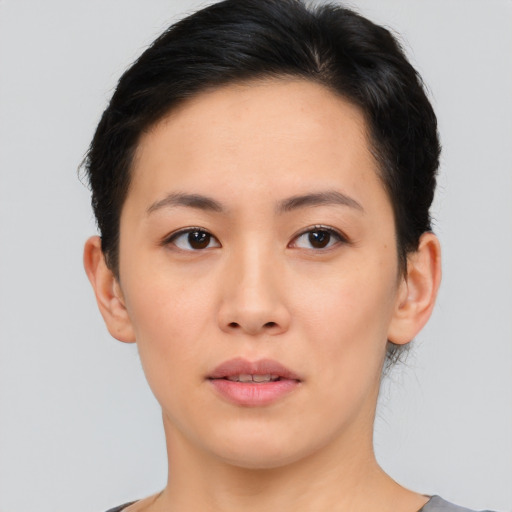 Neutral asian young-adult female with short  brown hair and brown eyes