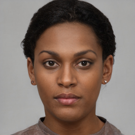 Neutral black young-adult female with short  black hair and brown eyes