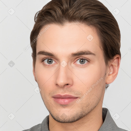 Neutral white young-adult male with short  brown hair and brown eyes