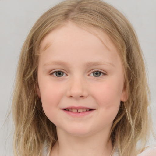 Joyful white child female with medium  brown hair and brown eyes