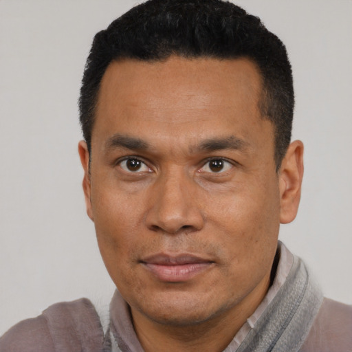 Neutral asian adult male with short  black hair and brown eyes