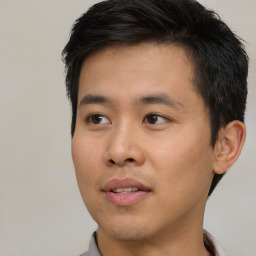 Neutral asian young-adult male with short  black hair and brown eyes