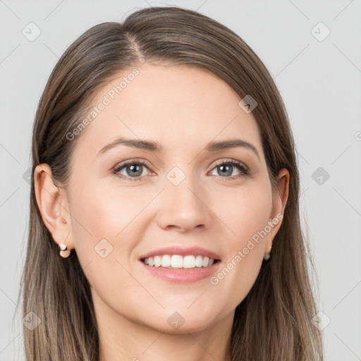 Joyful white young-adult female with long  brown hair and grey eyes