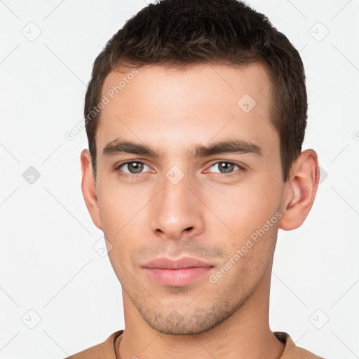 Neutral white young-adult male with short  brown hair and brown eyes