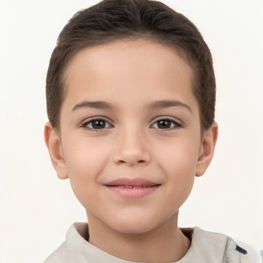 Joyful white child female with short  brown hair and brown eyes