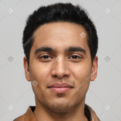 Joyful asian young-adult male with short  black hair and brown eyes