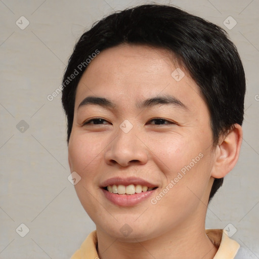 Joyful asian young-adult female with short  brown hair and brown eyes