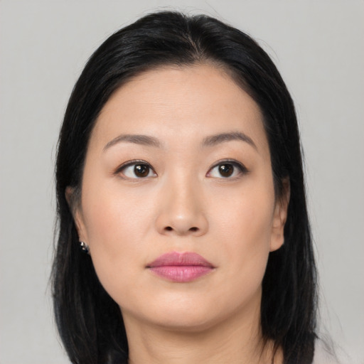 Neutral asian young-adult female with medium  black hair and brown eyes