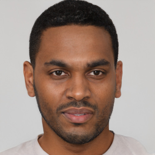 Neutral black young-adult male with short  black hair and brown eyes