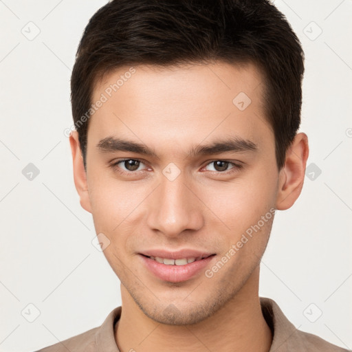 Joyful white young-adult male with short  brown hair and brown eyes