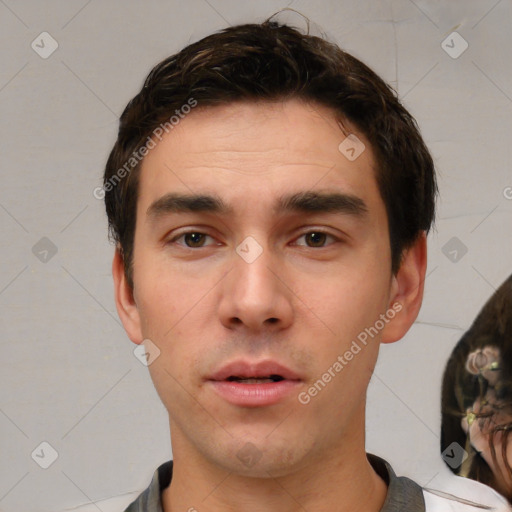 Neutral white young-adult male with short  brown hair and brown eyes