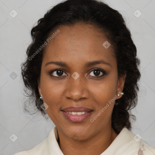 Joyful black adult female with medium  brown hair and brown eyes