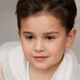 Joyful white child female with short  brown hair and brown eyes