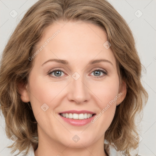 Joyful white young-adult female with medium  brown hair and green eyes