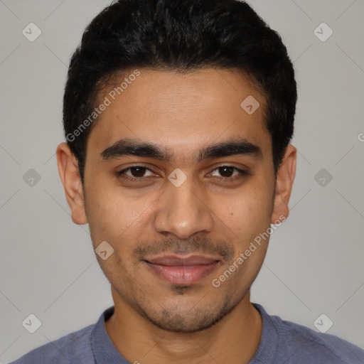 Joyful latino young-adult male with short  black hair and brown eyes