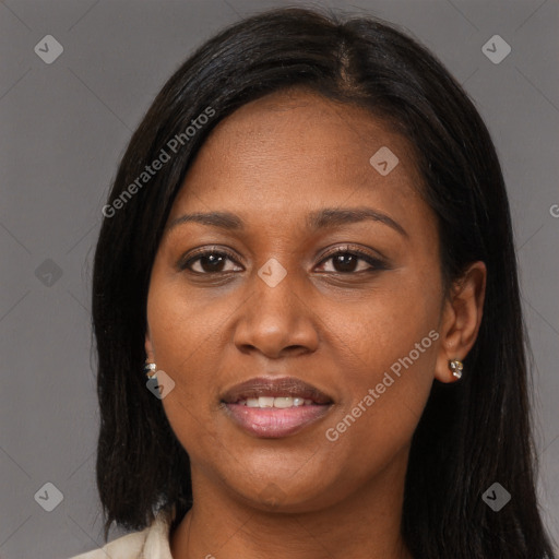 Joyful black young-adult female with long  brown hair and brown eyes
