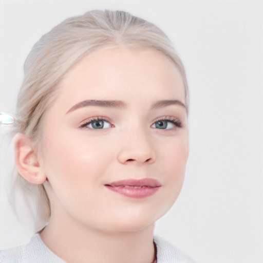 Joyful white young-adult female with medium  blond hair and blue eyes