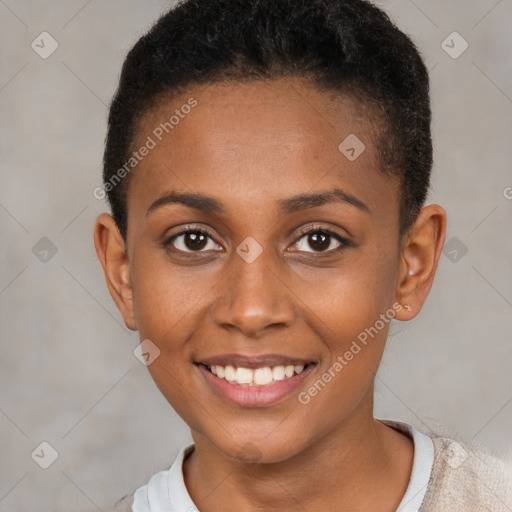 Joyful black young-adult female with short  brown hair and brown eyes