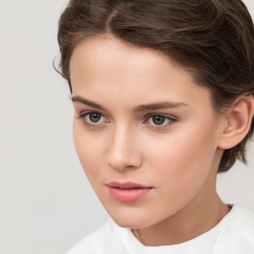 Neutral white young-adult female with medium  brown hair and brown eyes