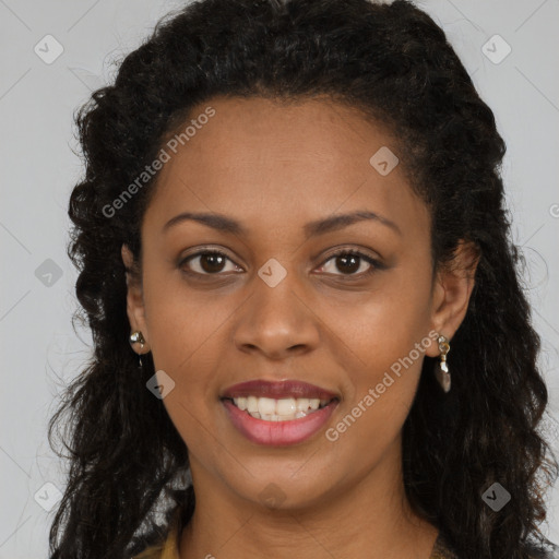 Joyful black young-adult female with long  brown hair and brown eyes