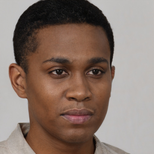 Neutral black young-adult male with short  brown hair and brown eyes