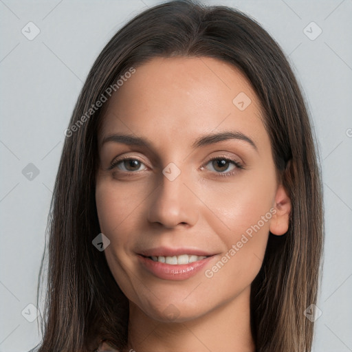 Joyful white young-adult female with long  brown hair and brown eyes