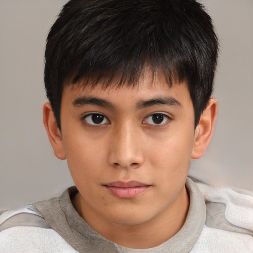 Neutral asian child male with short  brown hair and brown eyes