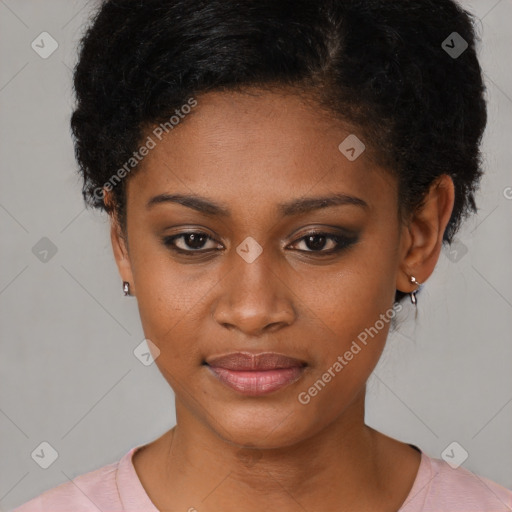 Joyful black young-adult female with short  black hair and brown eyes