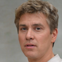 Neutral white adult male with short  brown hair and brown eyes