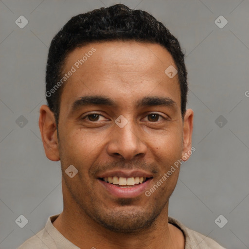 Joyful latino young-adult male with short  brown hair and brown eyes