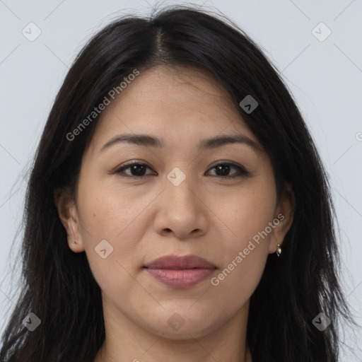 Joyful latino young-adult female with long  brown hair and brown eyes