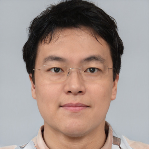 Neutral asian adult male with short  brown hair and brown eyes