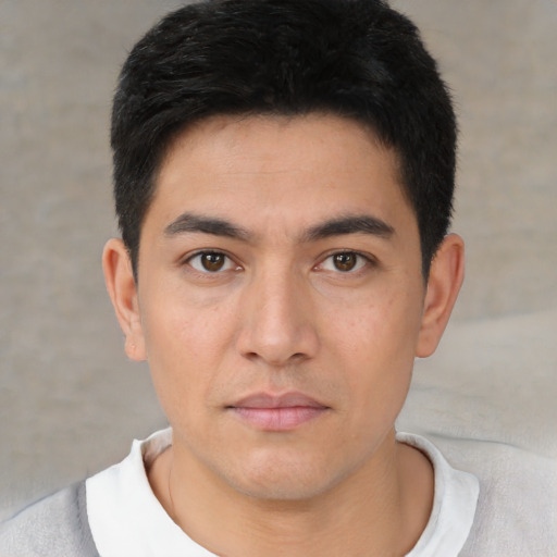 Neutral white young-adult male with short  black hair and brown eyes