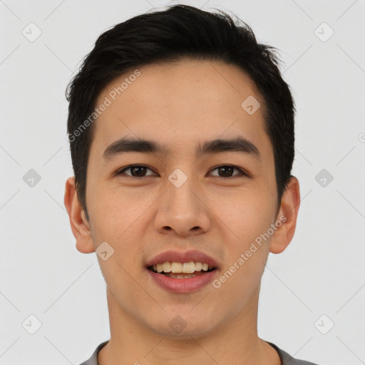 Joyful asian young-adult male with short  black hair and brown eyes