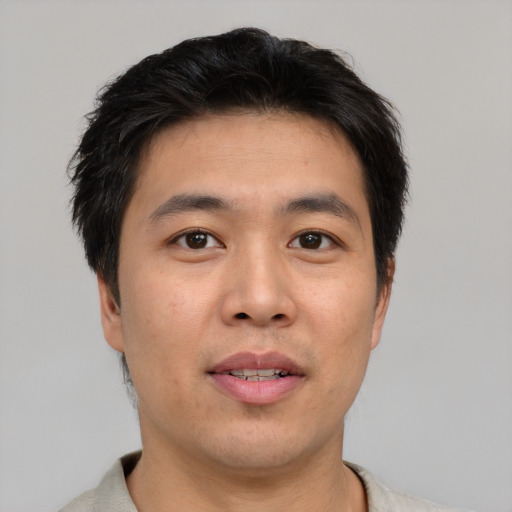 Neutral asian young-adult male with short  black hair and brown eyes