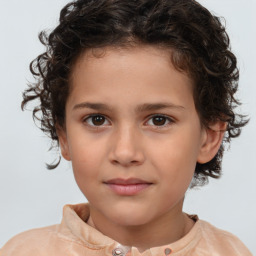 Joyful white child female with short  brown hair and brown eyes