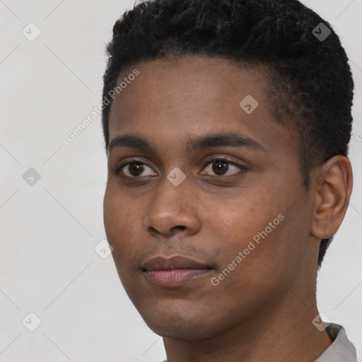 Neutral black young-adult male with short  black hair and brown eyes